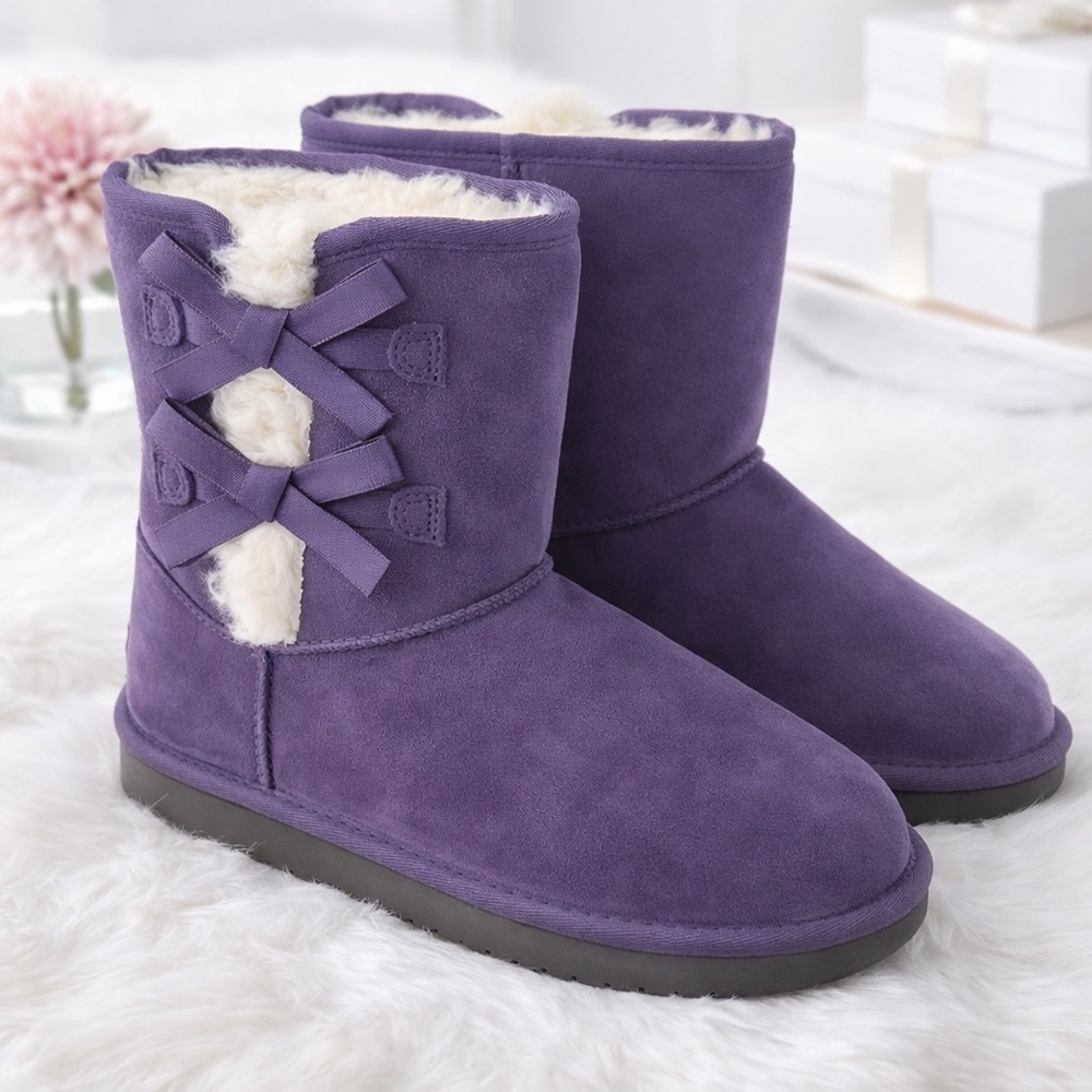 Uggs Koolaburra purple short size 4 with cream colored fur.  Brand new